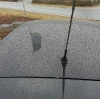 ''Regenwasser auf dem Autodach nachdem das Auto nanoversiegelt wurde